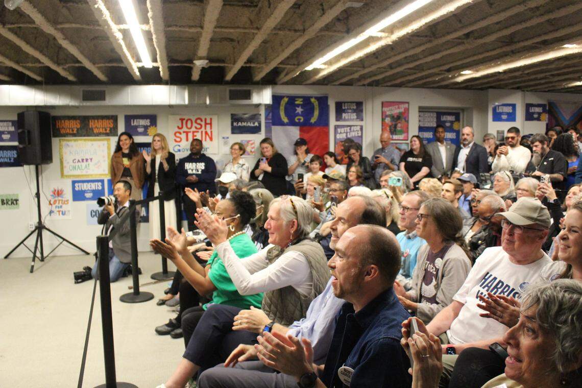 Canvassers for the Kamala Harris presidential campaign listen to First Lady Jill Biden speak in Durham, North Carolina, on Nov. 4, 2024.