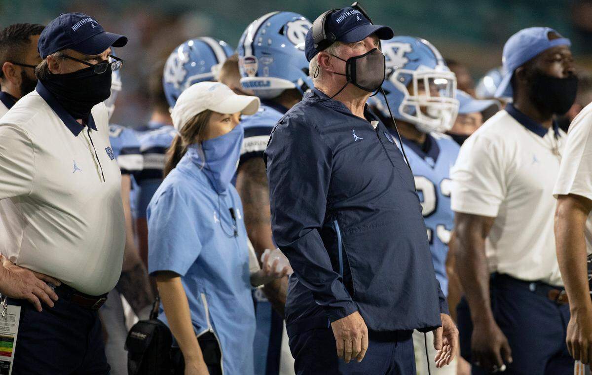 North Carolina coach Mack Brown watches his team during the Capital One Orange Bowl on Saturday, January 2, 2021in Miami Gardens, Florida