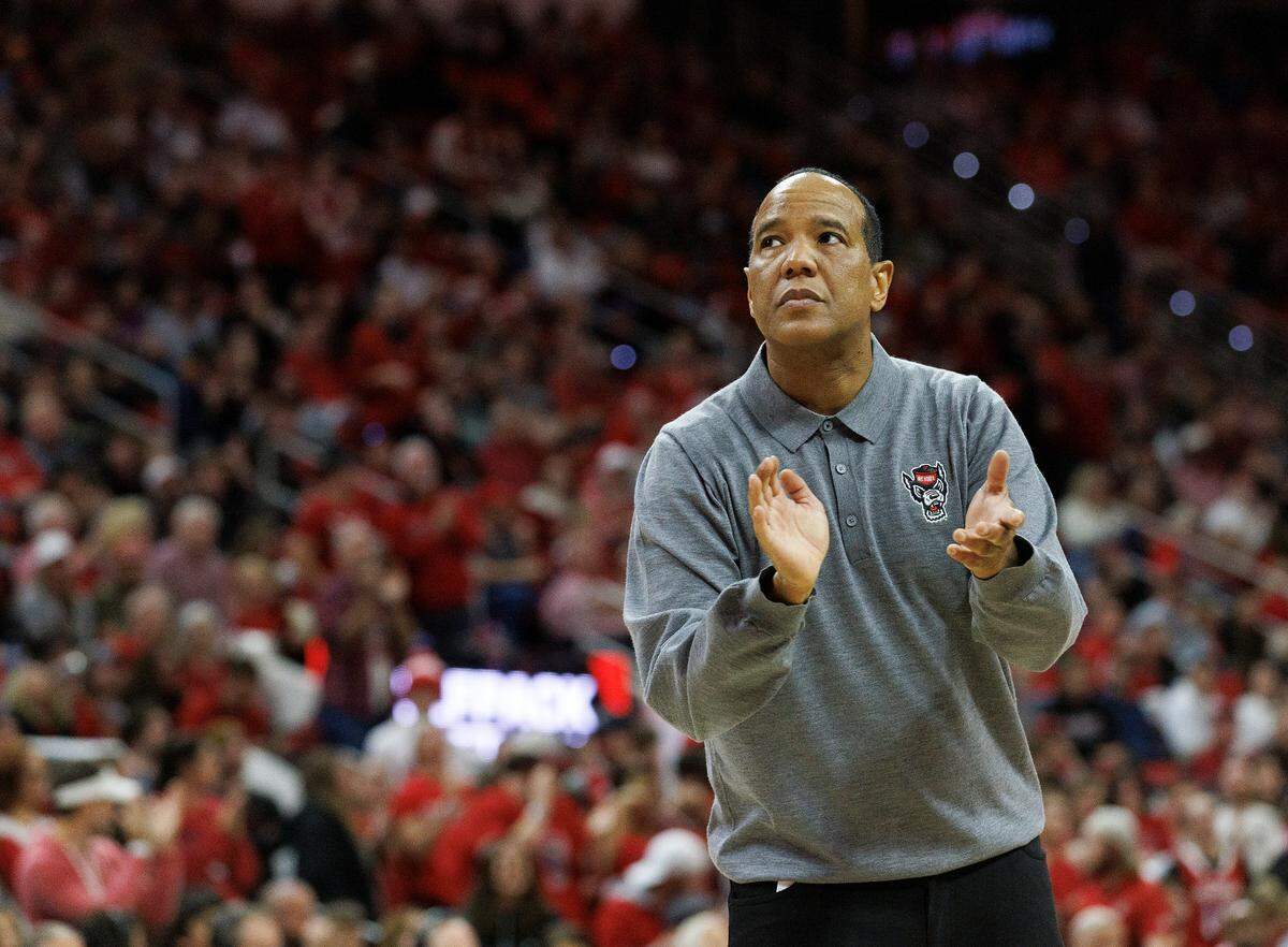 N.C. State head Kevin Keatts claps during a timeout in the second half of the Wolfpack’s 76-60 win over Virginia on Saturday, Jan. 6, 2024, at PNC Arena in Raleigh, N.C.