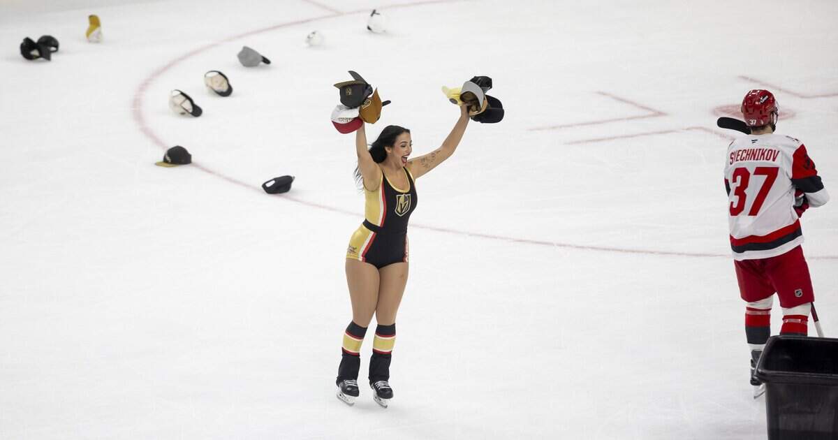 The Vegas ice crew removes hats from the ice after a hat trick by right wing Mitch Marner (93) to take a 4-0 lead over the Carolina Hurricanes in Game 3 of the Stanley Cup Final, on Saturday, June 6, 2026 at T-Mobile Arena in Las Vegas, NV.