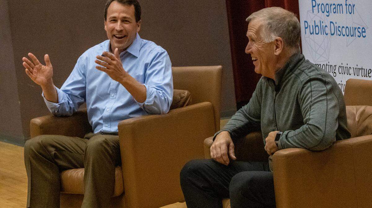 Former Democrat U.S. Senate candidate Cal Cunningham, left, and U.S. Republican Sen. Thom Tills discuss “how to build and maintain friendships across the political divide” during an event at UNC-Chapel Hill, Thursday, Nov. 10 2022.
