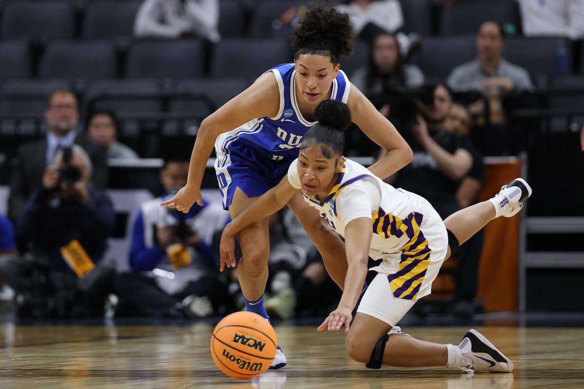 Jada Richard of LSU dives for the ball against Taina Mair of Duke during the second quarter of their 2026 NCAA Women’s Basketball Tournament Sweet 16 game at Golden 1 Center on March 27, 2026 in Sacramento, California.