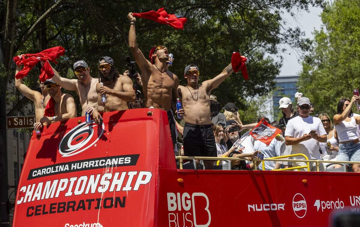 Thousands of Carolina Hurricanes fans gather in downtown Raleigh on Saturday, June 20, 2026, during a parade and rally celebrating the Hurricanes' Stanley Cup Final victory over the Vegas Golden Knights. The Hurricanes won the series 4-2 to capture the Stanley Cup for the second time since 2006.