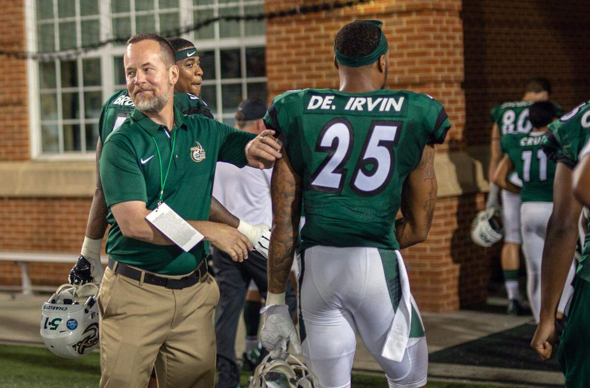 Athletic Director Mike Hill congratulating the team on the win over Fordham. Fordham vs Charlotte 49ers football, Saturday September 1st, 2018.