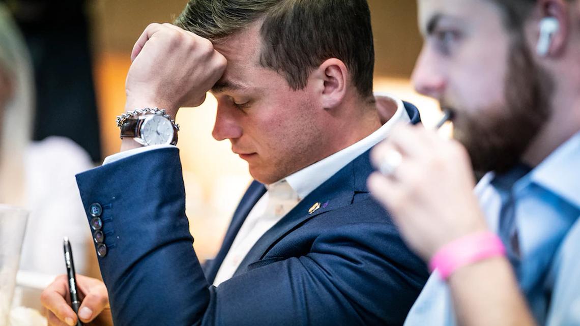 Rep. Madison Cawthorn (R-N.C.) watches results from the North Carolina May 17 primary election that he would narrowly lose.