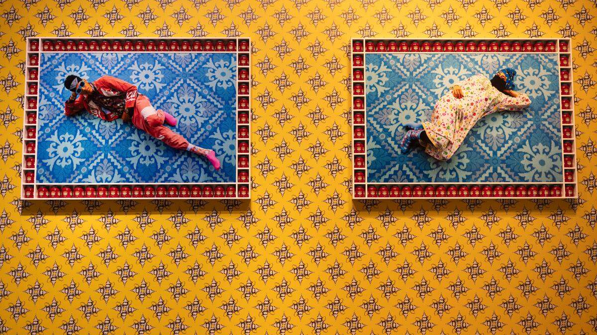 Basma Layin’, left and Majid Layin’, a commission by artist Hassan Hajjaj, is a new installation in the East Building of the North Carolina Museum of Art on Sept. 20, 2022, in Raleigh. The new installation is part of the museum’s The People’s Collection, Reimagined project.