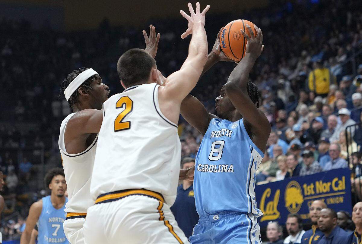 UNC’s Caleb Wilson (8) gets doubled by John Camden (2) and Lee Dort of California in the first half at Haas Pavilion on Jan. 17, 2026, in Berkeley, California.