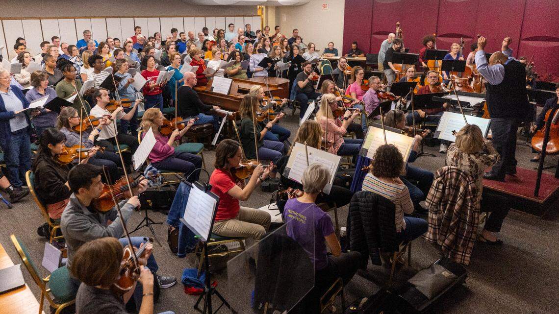 The Durham Symphony Orchestra, N.C. Central Kizazi Alumni Chorale and the Concert Singers of Cary rehearse Herman Whitfield III’s Overture-Fanfare in G Major at the Durham Arts Council on Tuesday, Feb. 4, 2025. Whitfield’s piece is part of Voices of the Unarmed: Justice, Love, Resilience, a free concert addressing police brutality against unarmed Black men.