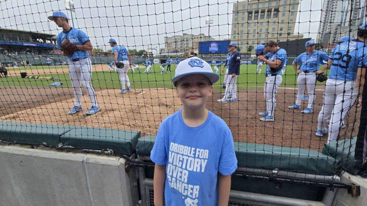 UNC baseball fan David Hill, 6, attends the ACC Championship at Truist Field in Charlotte, North Carolina.