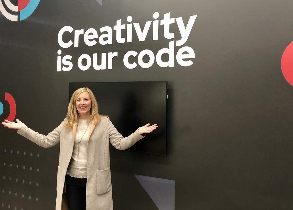 Red Hat Chief People Officer DeLisa Alexander stands in the new collaborative office space where the restaurant Bu.ku used to be located.
