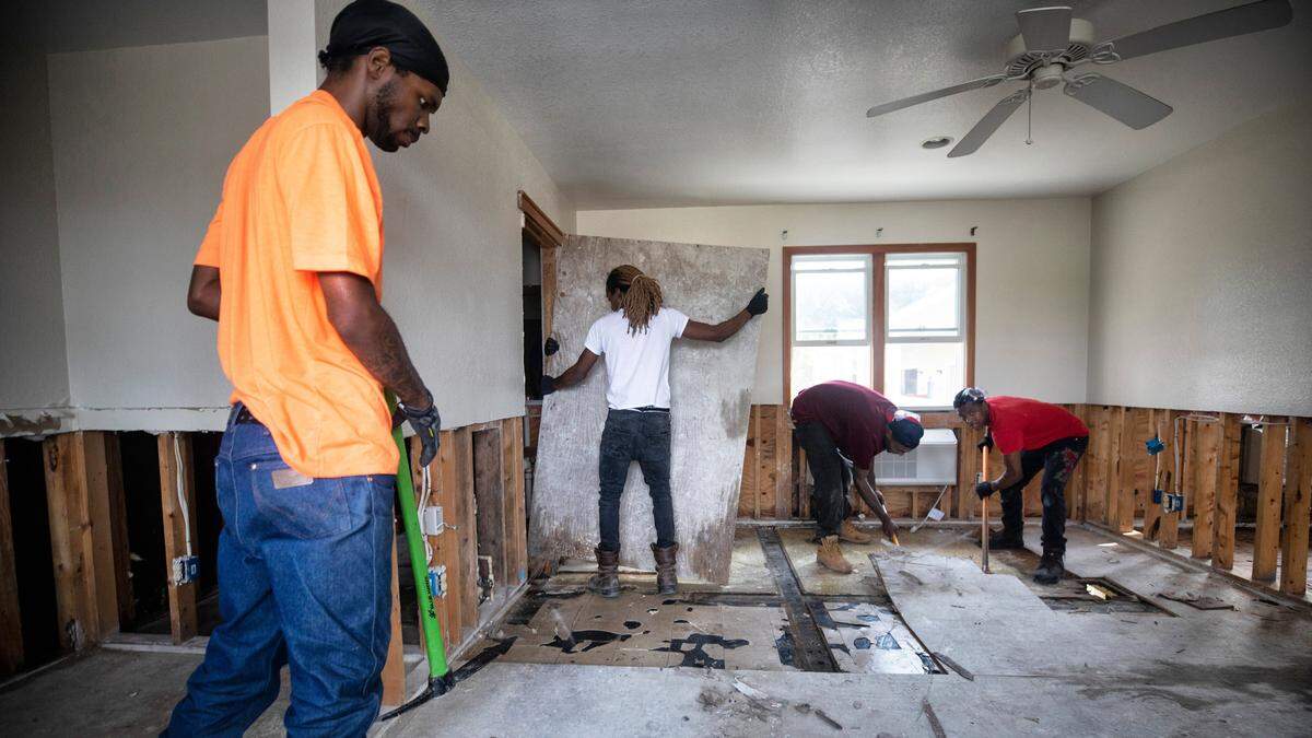 Servpro employees rip up floors on the first floor of the Pony Island Motel on Friday, Sept. 13, 2019, which was flooded by Hurricane Dorianís storm surge last Thursday.
