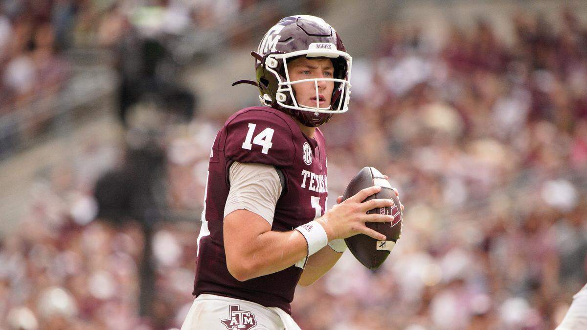 Texas A&M Aggies quarterback Max Johnson (14) looks to pass against South Carolina Gamecocks during the second half at Kyle Field.