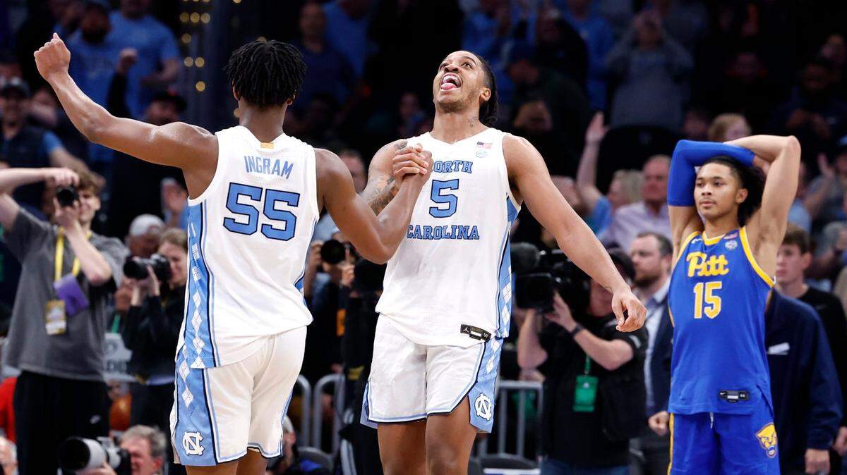 North Carolina’s Harrison Ingram (55) and Armando Bacot (5) celebrate as time runs out in UNC’s 72-65 victory over Pitt in the semifinals of the 2024 ACC Men’s Basketball Tournament at Capital One Arena in Washington, D.C., Friday, March 15, 2024.
