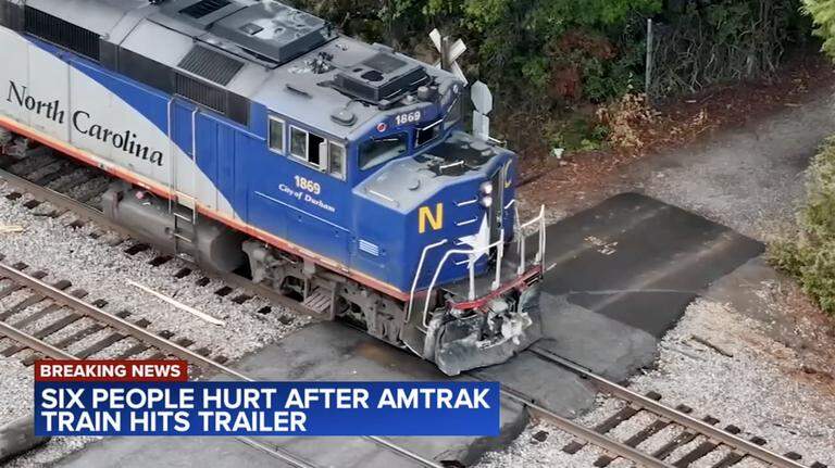 Police say a trailer detached in Cary. Moments later, an Amtrak hit it