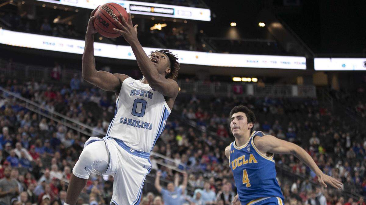 North Carolina’s Anthony Harris (0) breaks to the basket past UCLA’s Jamie Jaquez Jr. (4) for two of his 14 points past during the second half on Saturday, December 21, 2019 during the CBS Sports Classic at T-Mobile Arena in Las Vegas, Nevada.
