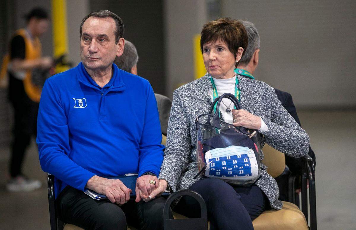 Duke coach Mike Krzyzewski and his wife Mickie hold hands as they arrive for the NCAA Final semi-final game against North Carolina on Saturday, April 2, 2022 at Caesars Superdome in New Orleans, La.