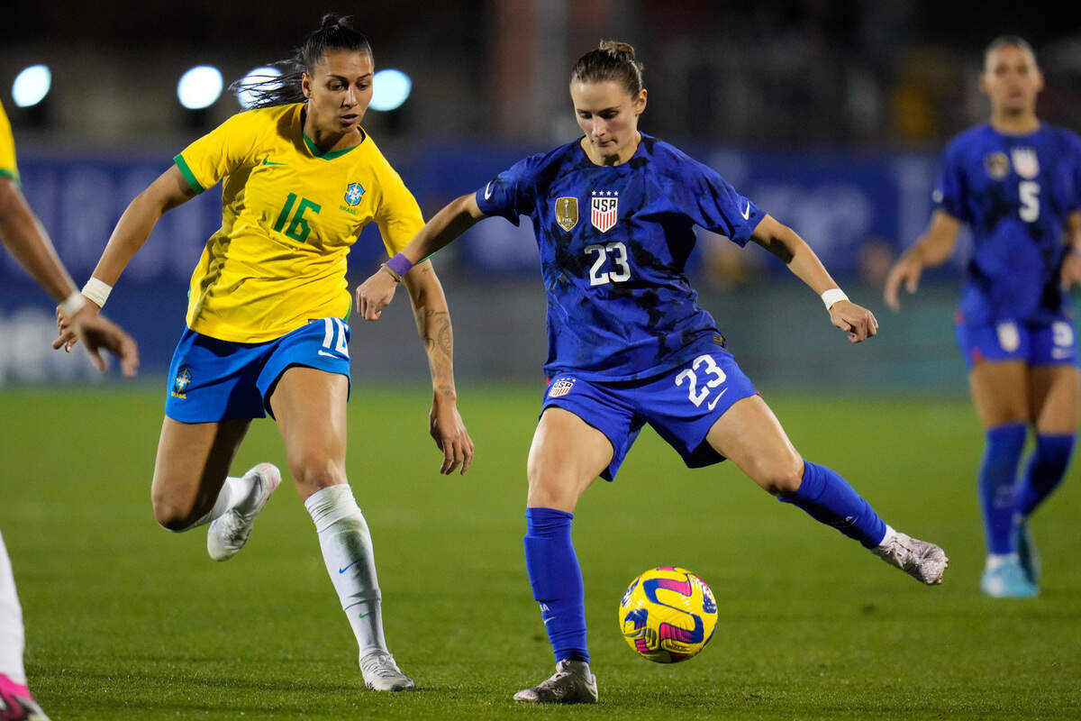 United States defender Emily Fox (23) dribbles against Brazil forward Bia Zaneratto (16) during the second half at Toyota Stadium.