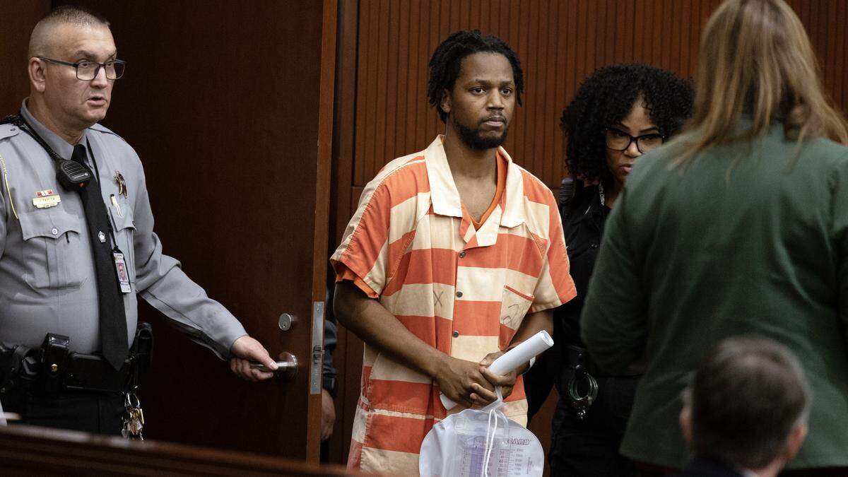 Benji Martin Jr. enters the courtroom for his first appearance in Wake County court, Monday afternoon, Nov. 24, 2025. Martin is accused of murder in the shooting death of WakeMed Garner police officer Roger Smith earlier this month.