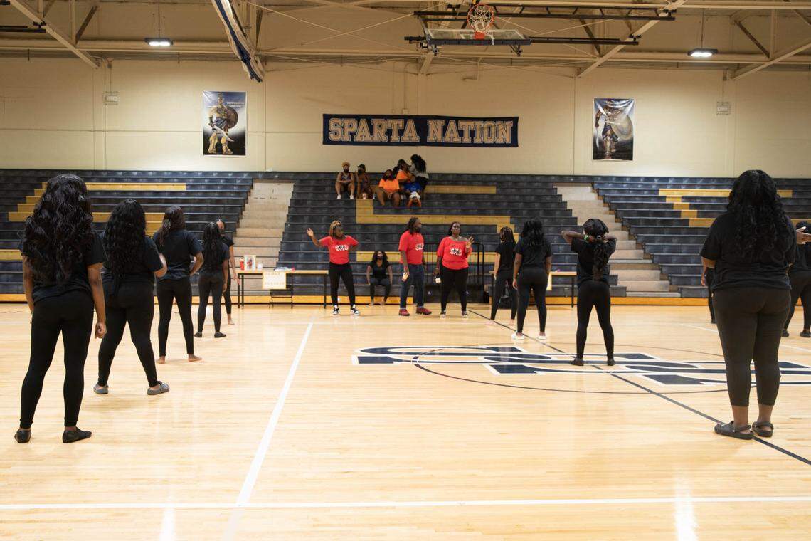 The Golden Xplosion dancers rehearse their dance routines ahead of their first majorette competition held at the Smithfield-Selma High School on Aug. 14, 2021.