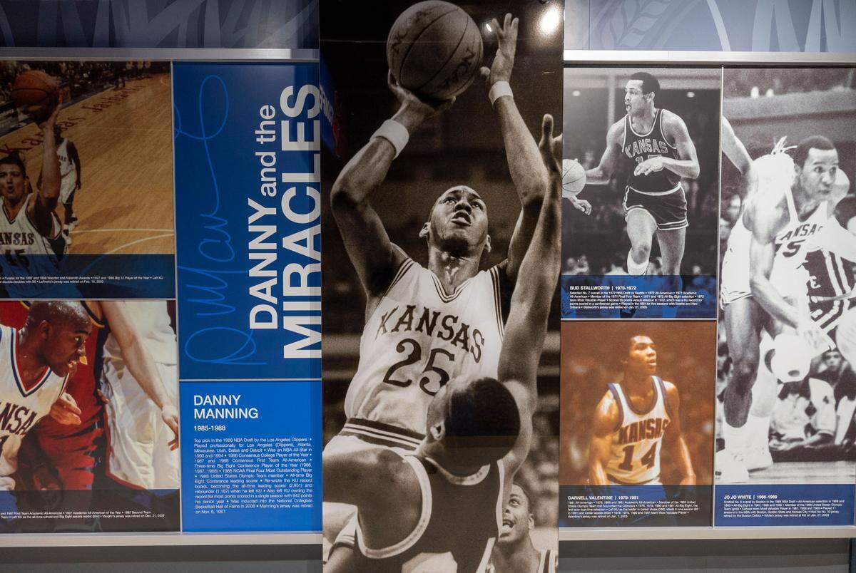 Danny Manning, who played high basketball in North Carolina, before enrolling at the University of Kansas, is part of a mural of images documenting the history of Kansas basketball at Allen Fieldhouse on Thursday, November 7, 2024 in Lawrence, Kansas.