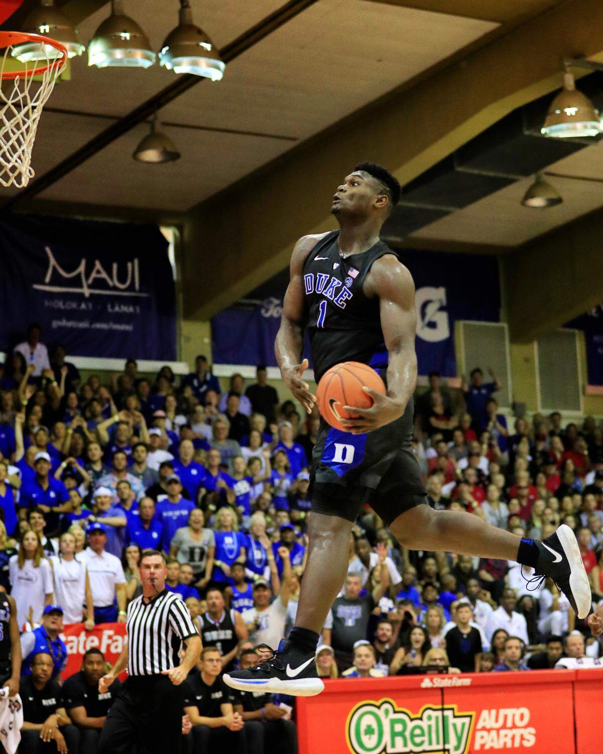 Duke forward Zion Williamson (1) goes up for a slam dunk over San Diego State during the second half at the Maui Invitational, Monday, Nov. 19, 2018, in Lahaina, Hawaii. 