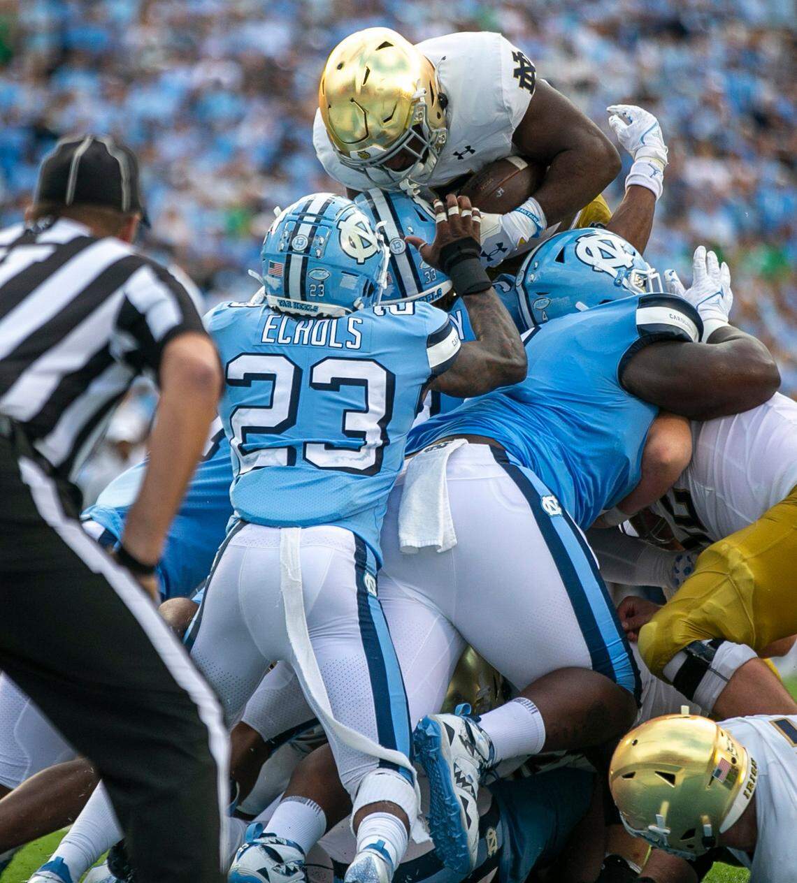 Notre Dame’s Audric Estime (7) scores on a one-yard carry to give the Irish a 38-14 lead over North Carolina in the third quarter on Saturday, September 24, 2022 at Kenan Stadium in Chapel Hill, N.C.