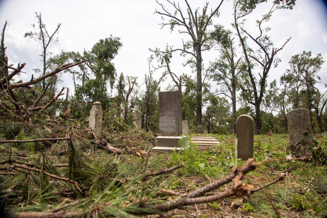 Downed trees and limbs lay in the path of a tornado in a cemetery near Rocky Mount Thursday, July 20, 2023. An EF3, tornado with wind speeds of 150 mph touched down in Nash County Wednesday around 12:30 p.m. Wednesday according to the Raleigh National Weather Service.