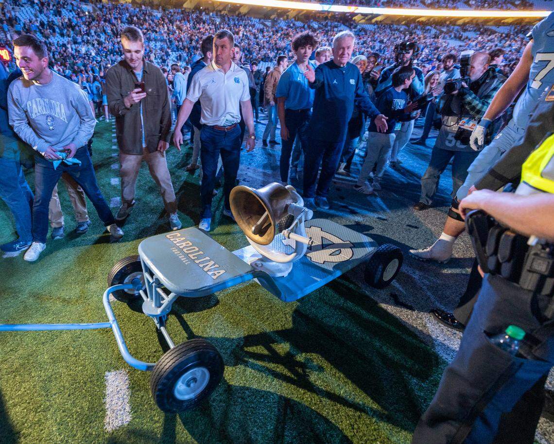 North Carolina coach Mack Brown steps aside as the victory bell is pulled into the North Carolina locker room following the Tar Heels’ 47-45 victory over Duke on Saturday, Nov. 11, 2023 at Kenan Stadium in Chapel Hill, N.C.