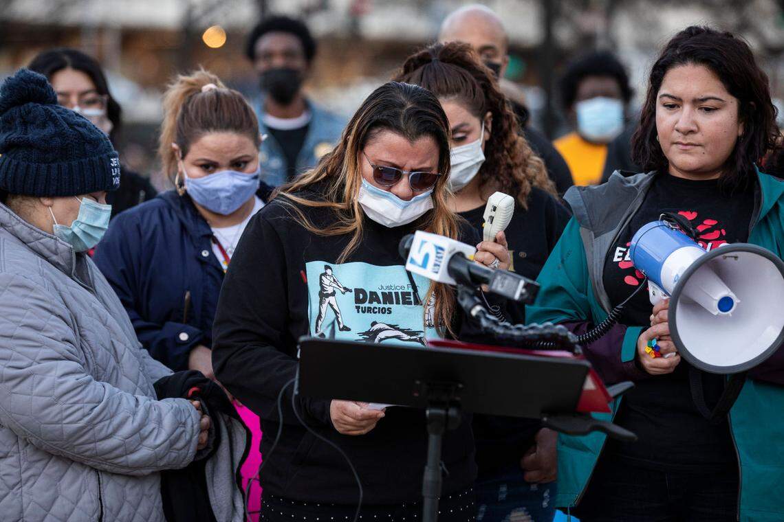 Rosa Jerez, the wife of Daniel Turcios, a man who was shot and killed by Raleigh police in January, gives an emotional speech to a crowd gathered to support her and call for justice for her husband in downtown Raleigh, N.C. on Thursday, Feb. 10, 2022.