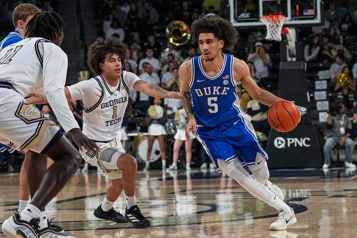 Duke Blue Devils guard Tyrese Proctor (5) dribbles against Georgia Tech Yellow Jackets guard Naithan George (1) during the first half at McCamish Pavilion.