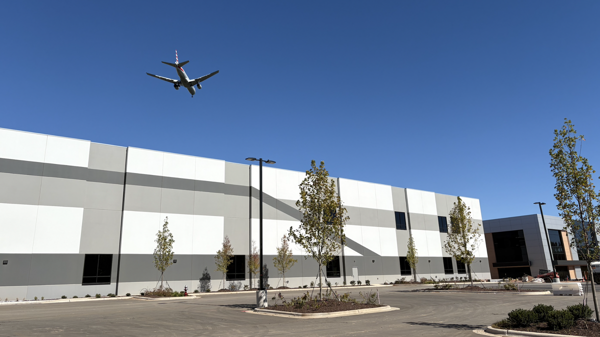 A plane flying overhead King Street Properties’ initial two buildings at 4880 McCrimmon Pkwy. It’s on its new 75-acre Pathway Triangle campus in Morrisville.