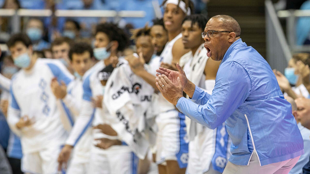 North Carolina coach Hubert Davis applauds his team on offense during the first half against Loyola Maryland on Tuesday, November 9, 2021 in Chapel Hill, N.C.