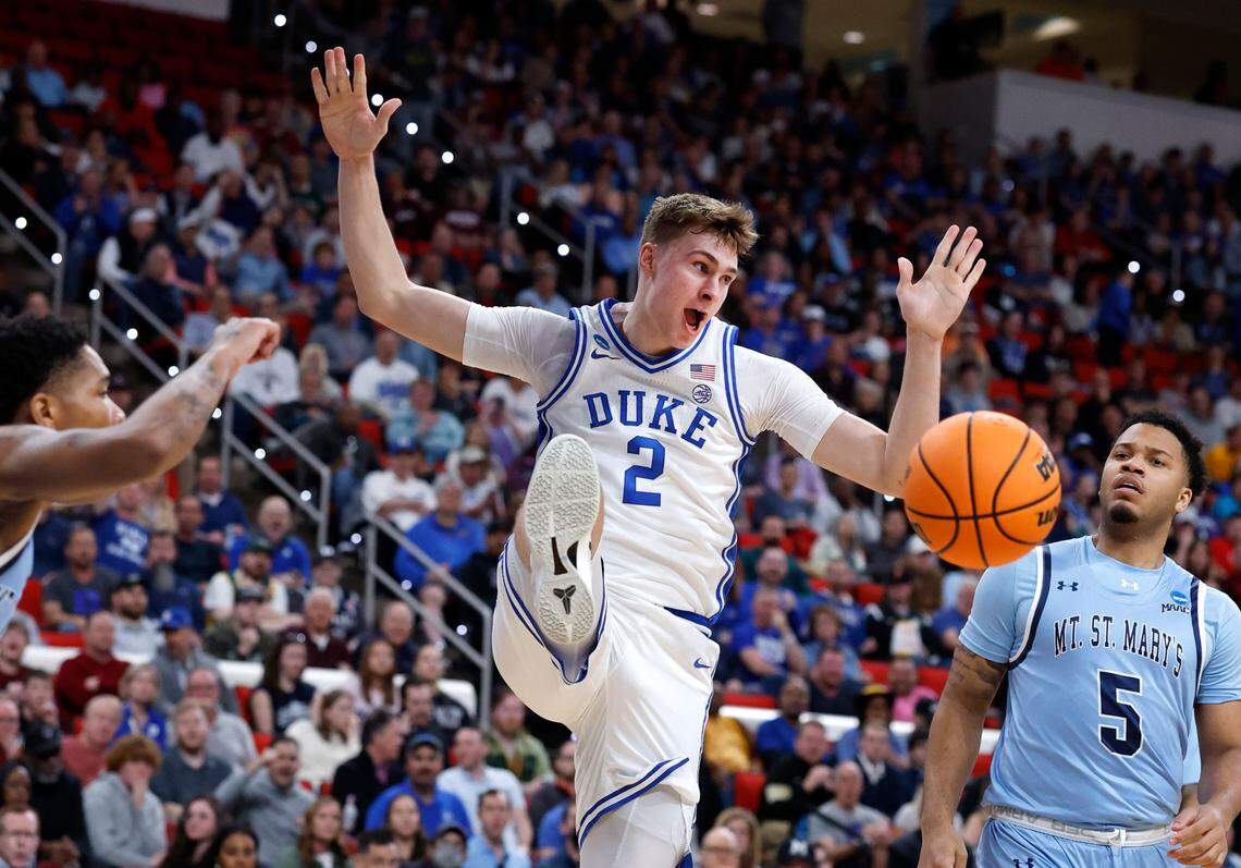 Duke’s Cooper Flagg (2) reacts after slamming in two during the first half of Duke’s game against Mount St. Mary’s in the first round of the 2025 NCAA Men’s Basketball Tournament at the Lenovo Center in Raleigh, N.C., Friday, March 21, 2025.