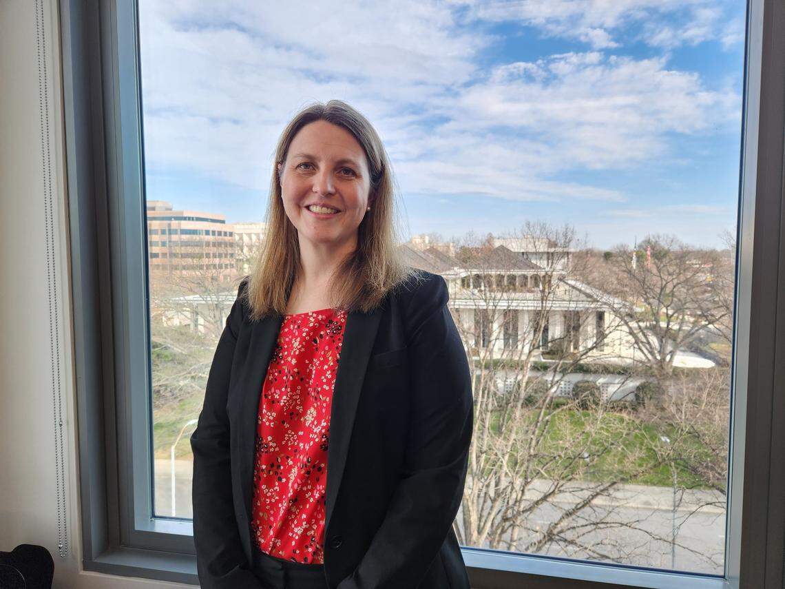 North Carolina State Budget Director Kristin Walker, pictured in the Office of State Budget and Management on the 5th floor of the Department of Administration building in downtown Raleigh, N.C. Through the window behind her is the Legislative Building.