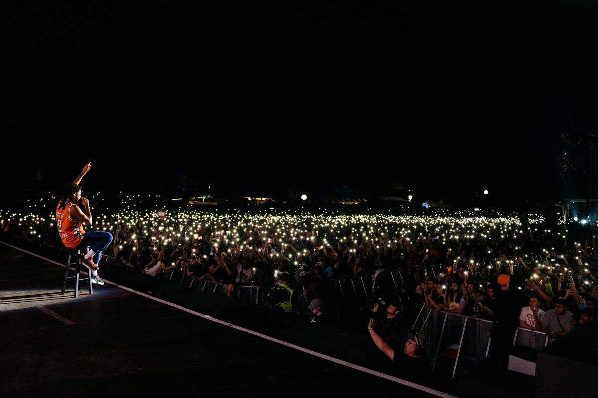 J. Cole performs at the Dreamville Festival in Raleigh, NC, April 2019. The festival was years in the making with Cole wanting to bring a major event to his home state. Cole wanted to show aspiring artists that North Carolina is capable of creating its own vibrant music scene.