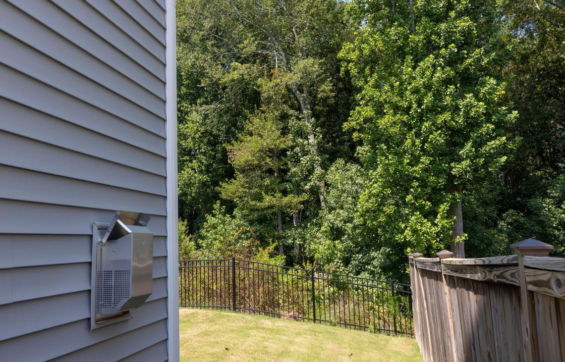 A broken tree limb behind a home on Copain Cove in the Sonoma Springs neighborhood in Fuquay-Varina, N.C. on Wednesday, August 3, 2022, where pilot Charles Hew Crooks body was found on Friday, July 29. Crooks reportedly exited the twin-engine aircraft he was co-piloting while en route to RDU International.