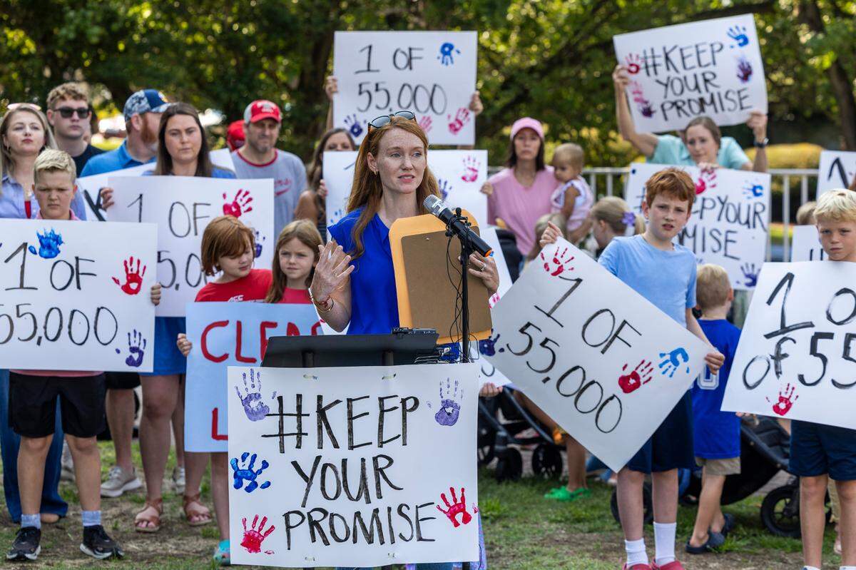 Rachel Brady speaks during a rally on Halifax Mall in Raleigh on Wednesday, July 31, 2024. Parents and students at the rally urged Republican lawmakers to keep their promise to fully fund private school vouchers for the 55,000 students on the Opportunity Scholarship waiting list.