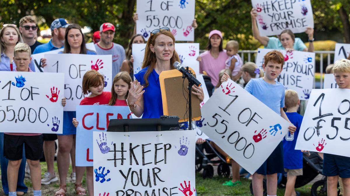 Rachel Brady speaks during a rally on Halifax Mall in Raleigh on Wednesday, July 31, 2024. Parents and students at the rally urged Republican lawmakers to keep their promise to fully fund private school vouchers for the 55,000 students on the Opportunity Scholarship waiting list.