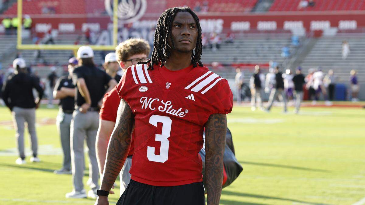 N.C. State safety Rente Hinton (3) watches warmups before N.C. State’s game against ECU at Carter-Finley Stadium in Raleigh, N.C., Thursday, August 28, 2025.