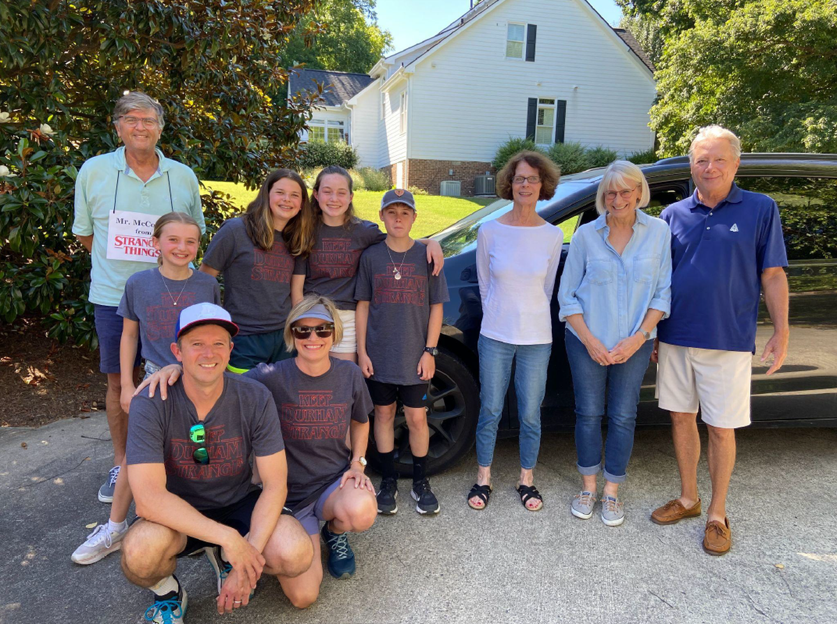 The Barron Family on their Durham/“Stranger Things” tour in 2022, meeting the real Mr. McCorkle (Pope ‘Mac’ McCorkle, top left), Cathy Gracey (”Miss Gracey,” third from right) and the parents of Matt and Ross Duffer, Allen Duffer and Ann Christensen (far right).