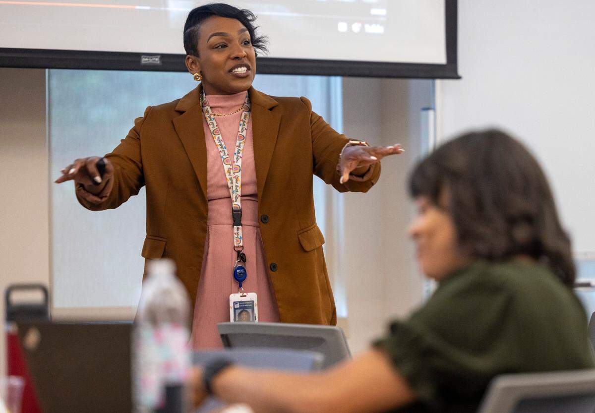 Shannon E. Utley, a Wake County Permanency Services Social Worker, teaches a class for fellow social workers, focusing on diversity, equity, inclusion and justice for their clients at the Wake County Health & Human Services.
