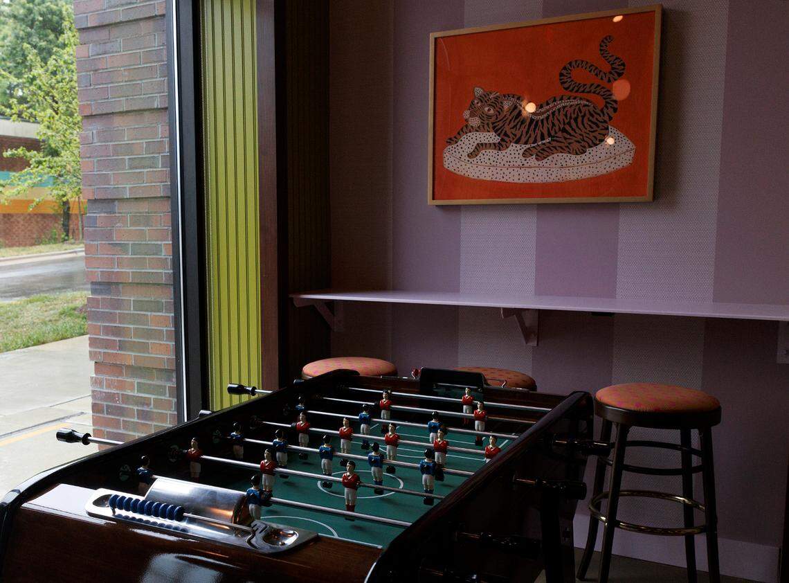 Jaguar Bolera, an “eatertainment” venue in Raleigh Iron Works, features foosball, duckpin bowling, darts and karaoke.