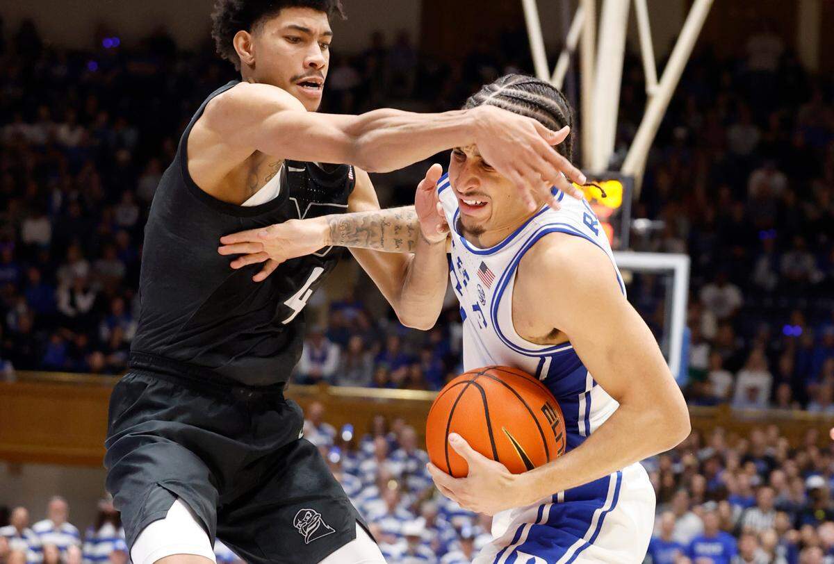 Duke’s Tyrese Proctor (5) drives past Virginia Tech’s Rodney Brown Jr. (4) during the second half of Duke’s 88-65 victory over Virginia Tech at Cameron Indoor Stadium in Durham, N.C., Tuesday, Dec. 31, 2024.
