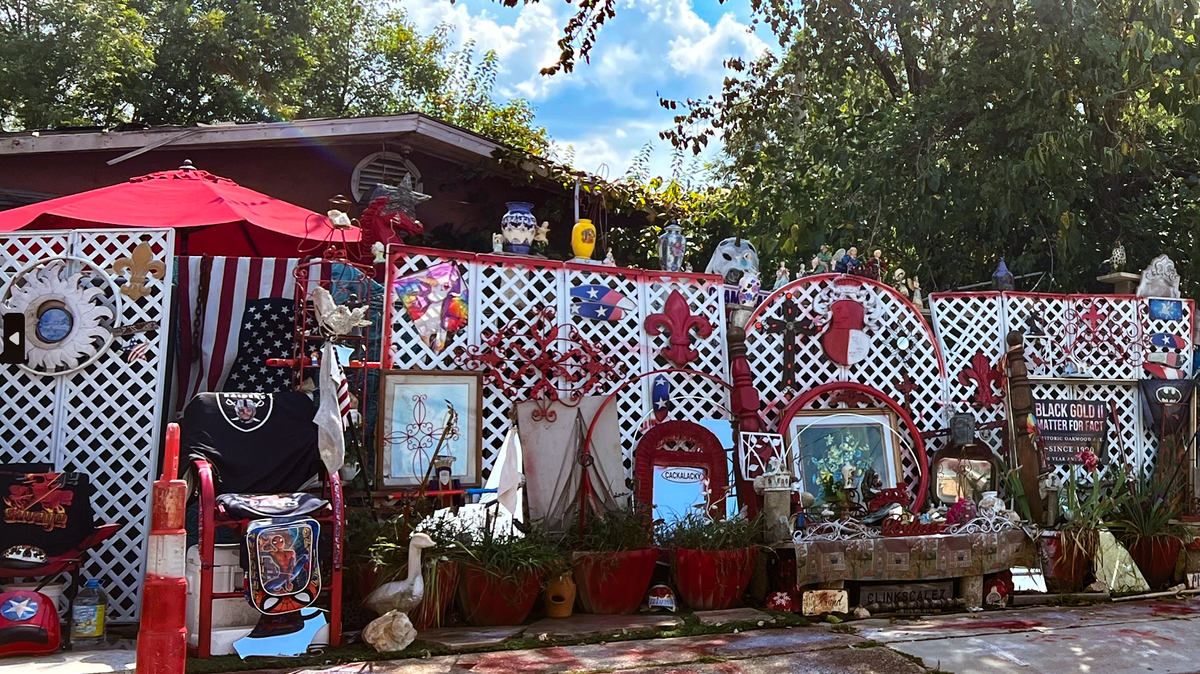Raleigh removed the longstanding decorations outside 1602 Oakwood Avenue after it began to block the sidewalk. The neighborhood around St. Augustine’s University remains upset.