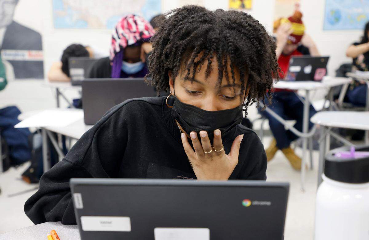 Junior Alysia Davis works during her IB History class at Hillside High School in Durham, N.C., Thursday, April 28, 2022.