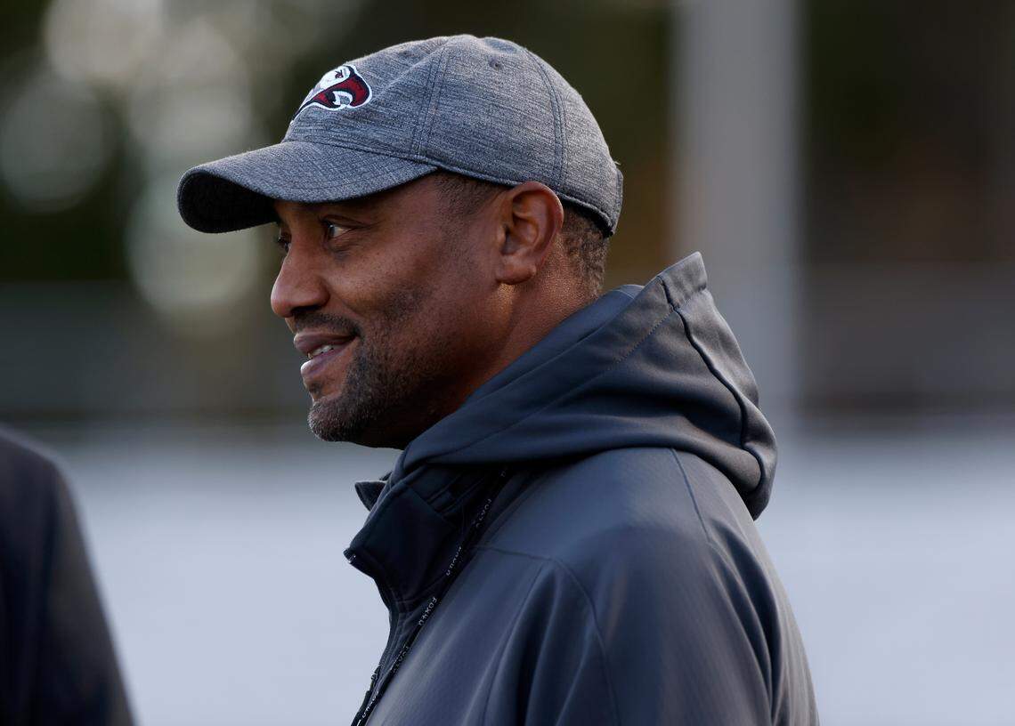 North Carolina Central football coach Trei Oliver smiles at the start of practice at O’Kelly-Riddick Stadium on Tuesday, Oct. 18, 2022, in Durham, N.C.