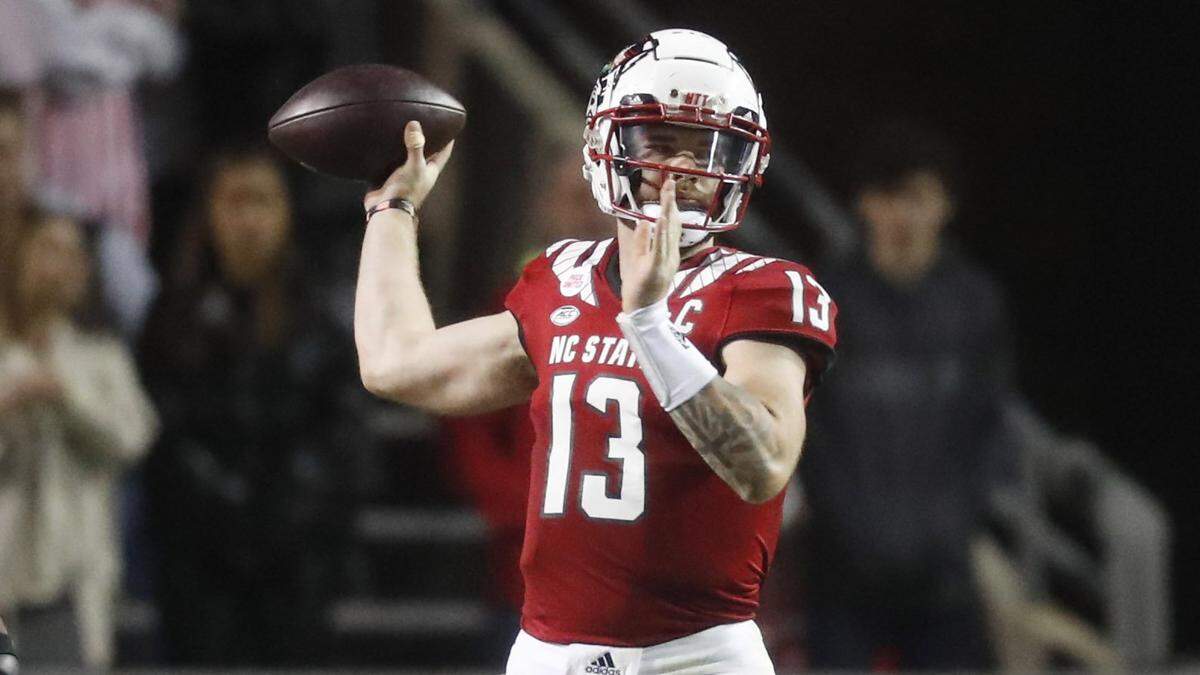 N.C. State quarterback Devin Leary (13) passes during the first half of N.C. Stateís game against Louisville at Carter-Finley Stadium in Raleigh, N.C., Saturday, October 30, 2021.