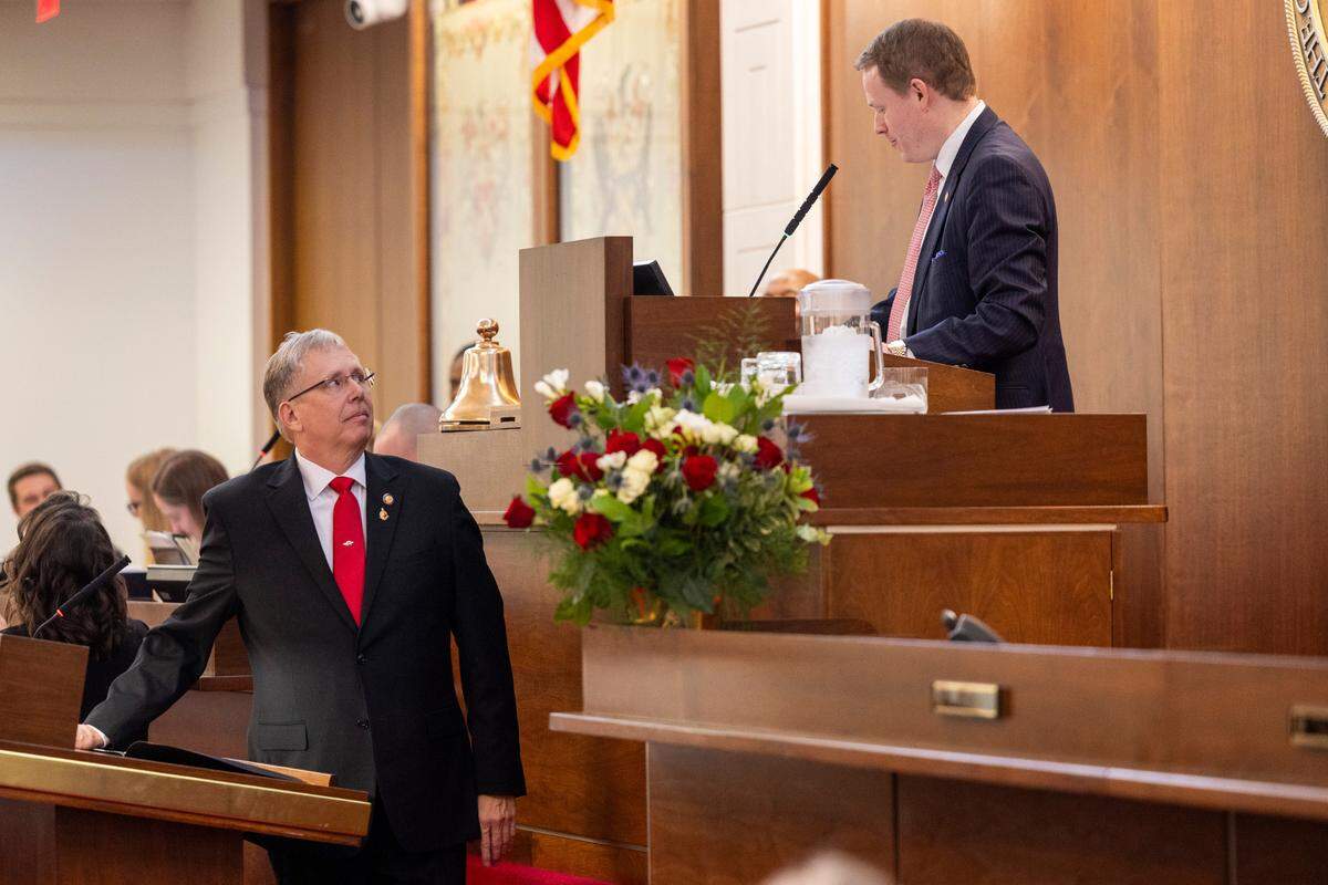 Newly elected House Speaker Pro Tempore Rep. Mitchell Setzer, left, speaks from the House well as newly elected House Speaker Destin Hall looks on during the North Carolina General Assembly’s first 2025 legislative session on Wednesday, Jan. 8, 2025, at the Legislative Building.