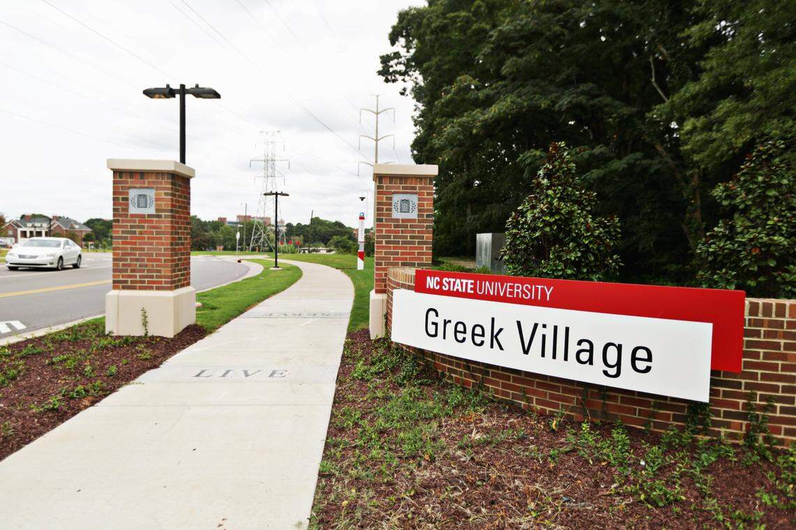 A sign outside an entrance to Greek Village on the South Campus of N.C. State University in Raleigh, N.C., photographed Monday, August 24, 2020.