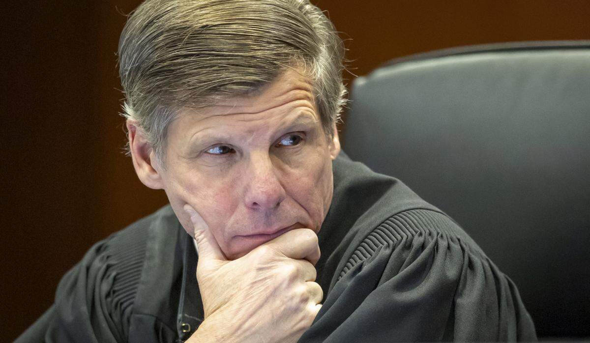 Wake County Superior Court Judge Paul C. Ridgeway listens to testimony from Dr. Maher Noureddine, a forensic DNA consultant, during the sentencing of Austin Thompson on Wednesday in Raleigh. 